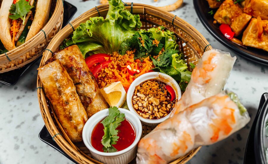 Delicious Vietnamese Food Including Pho Ga Noodles Spring Rolls White Wall